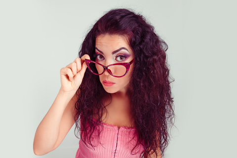 Dopamine Girl - small female, front view, ((very small breasts)), wavy  blonde hair, blush face, red lipstick, earrings, (thick glasses), pouting  lips, riding in back seat of a car, her head tips